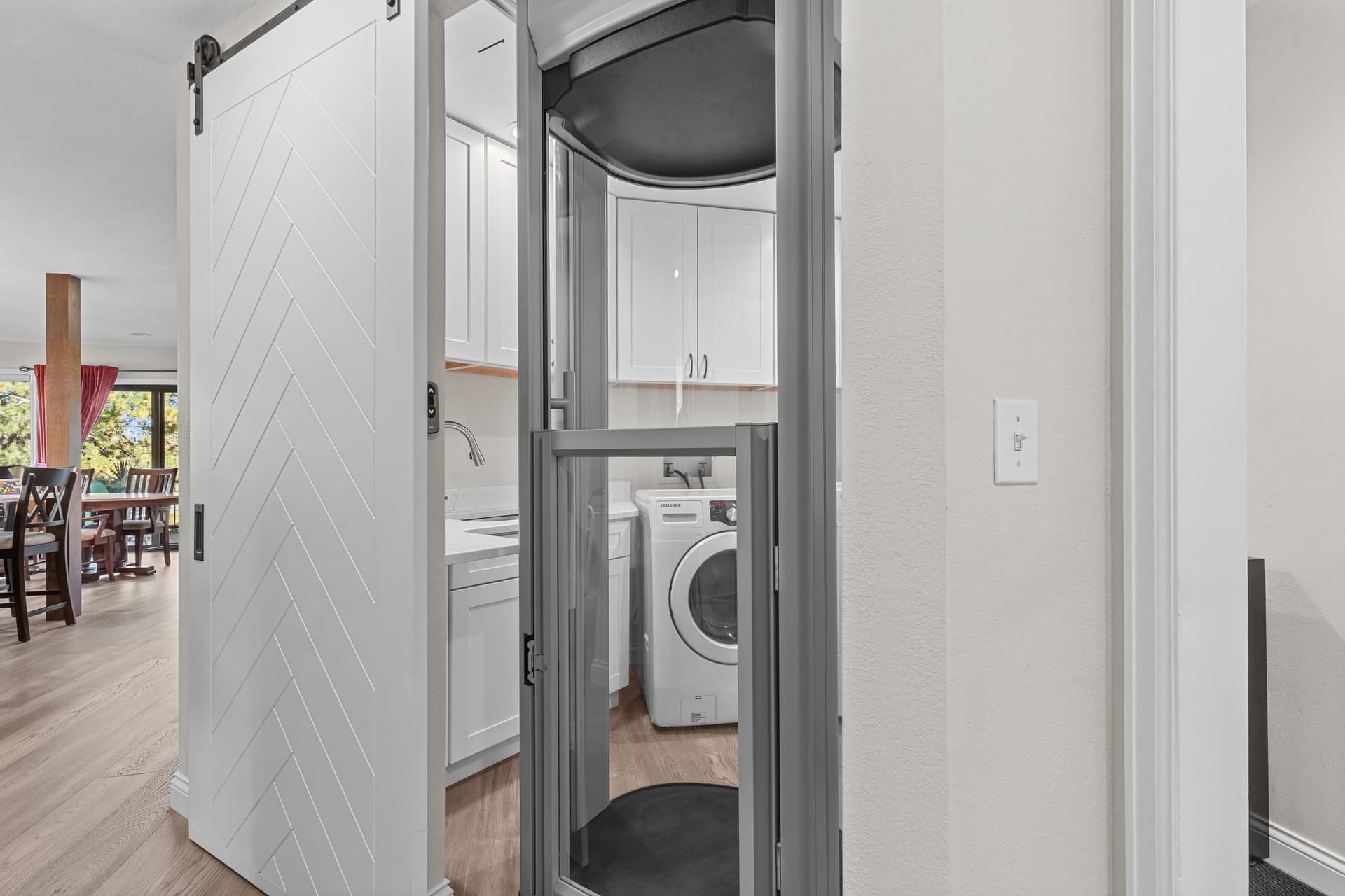 Residential elevator integrated into finished home spaces