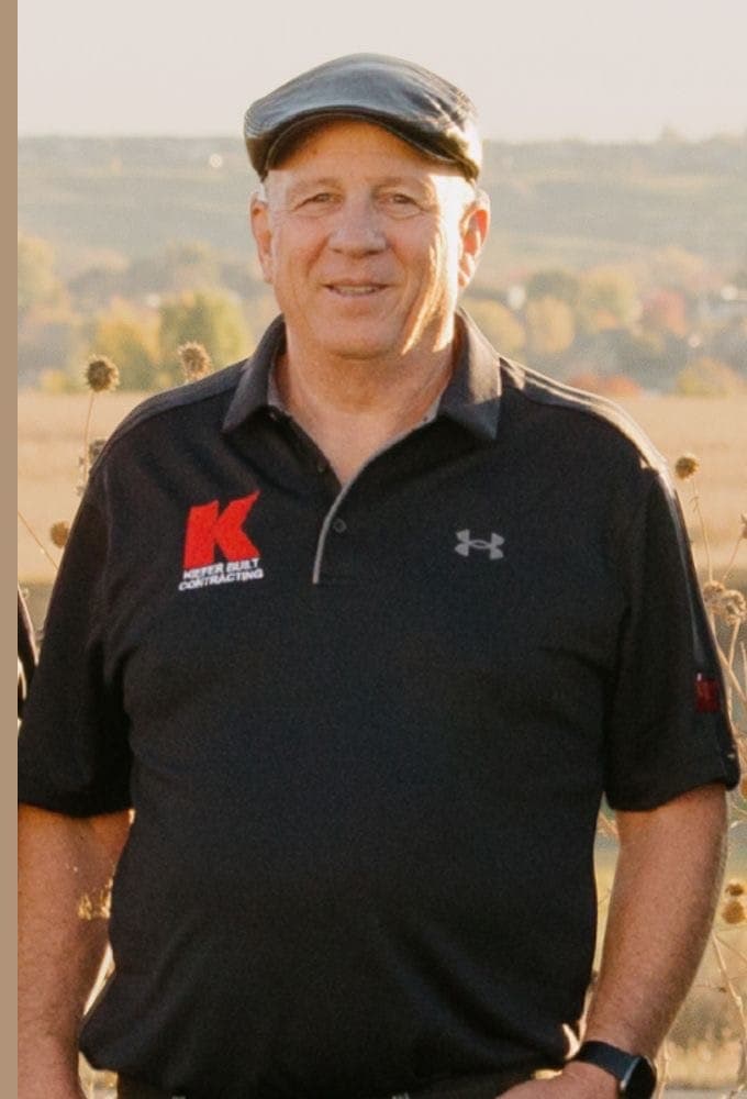 Mark Kiefer wearing a Kiefer Built shirt outdoors